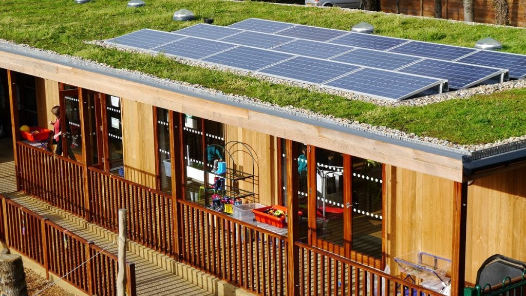 Modular Eco Building at Bickley Park Bromley with solar panels and seedum roof by TGEscapes