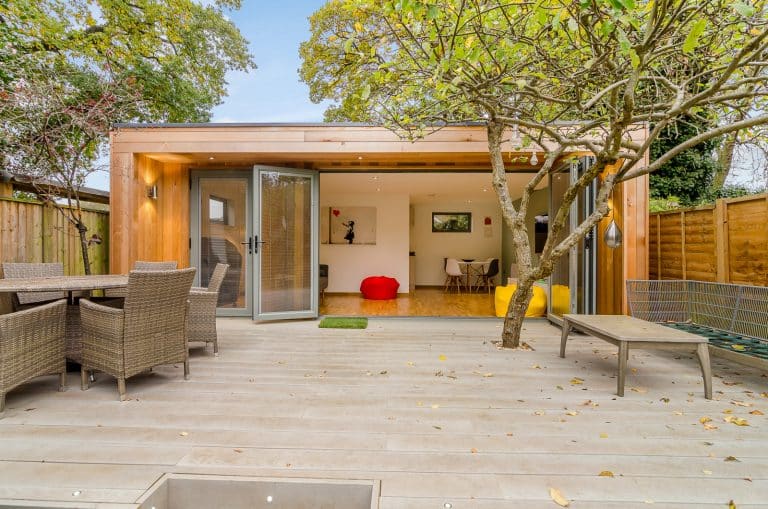 Multi use Modular Garden Room by TGEscapes Timber frame eco building with sliding doors and cedar cladding
