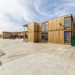 Classroom Block for 600 students at Woolwich Polytechnic Secondary School by TGEscapes with cedar cladding