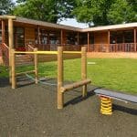 Modular eco Classroom at Danesfield School by TGEscapes with cedar cladding, decking and play park