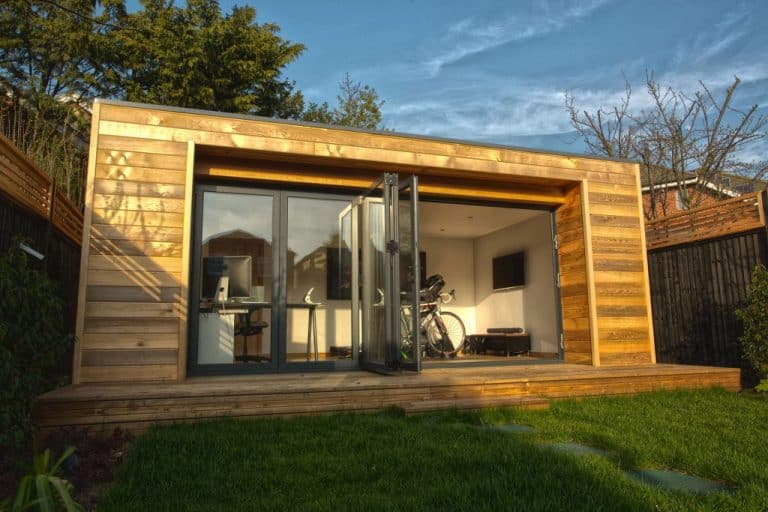 Modular Timber Frame Garden office eco building with bi-fold doors and cedar cladding by TGEscapes