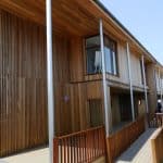 Classroom Block for 600 students at Woolwich Polytechnic Secondary School by TGEscapes with cedar cladding