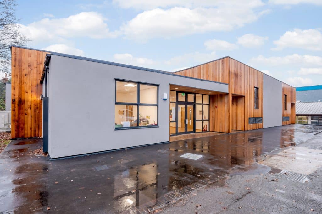 Timber framed twin performing art studio with render and cedar cladding by TGEscapes