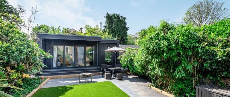 Modular timber frame garden gym and spare living area by TGEscapes