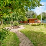 Modular timber frame building in a biodiverse setting