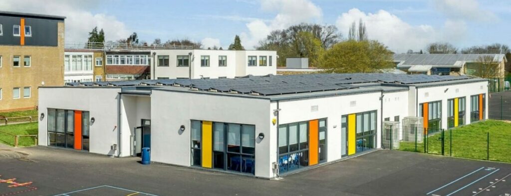 Modular timber frame net zero multi classroom block with white render by TGEscapes